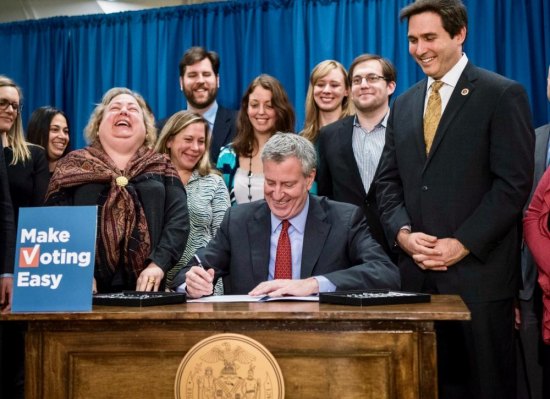 Step One: Pass Online Voter Registration... Mayor de Blasio, Council Member Ben Kallos (right) at online voter registration bill signing.